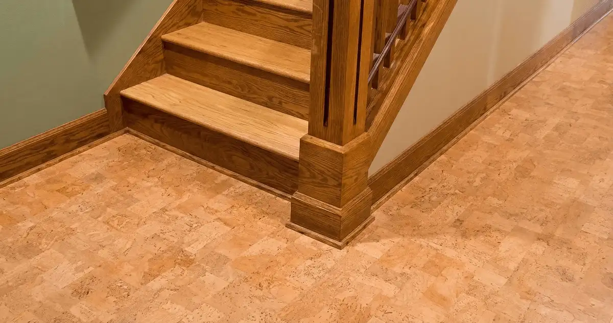 End of a staircase with cork flooring in Ann Arbor, MI