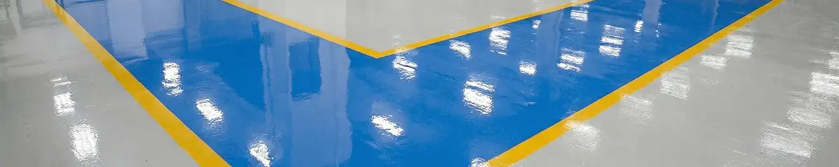 A factory floor professionally covered and marked with epoxy flooring in Ann Arbor, MI