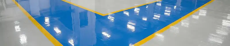 A factory floor professionally covered and marked with epoxy flooring in Ann Arbor, MI