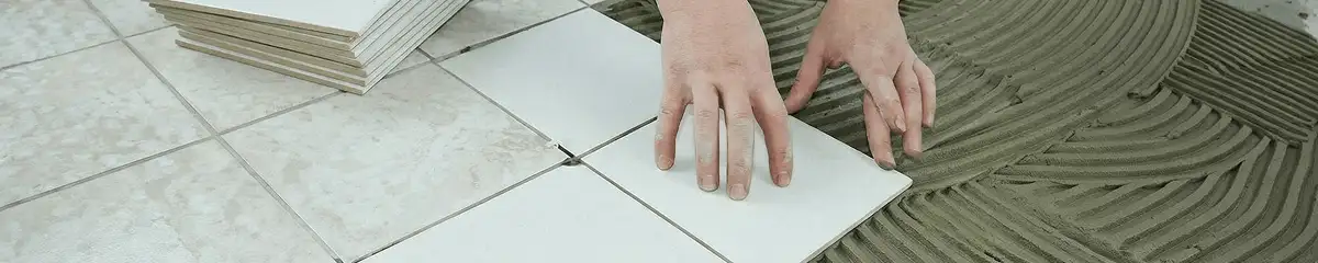 Professional installing white tile floors in Ann Arbor, MI