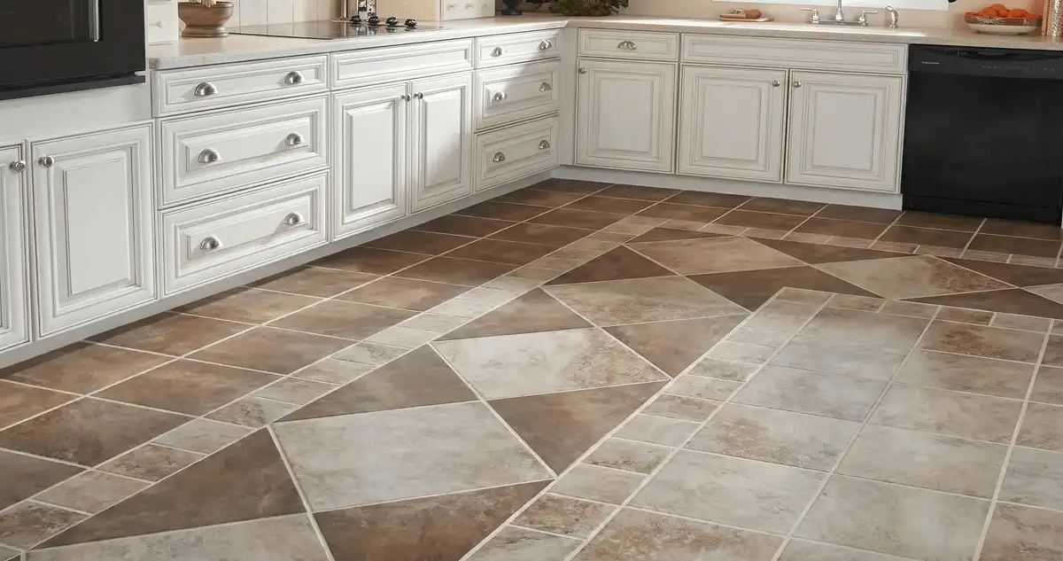 Kitchen with white cabinets and a professionally installed tile floor in Ann Arbor, MI